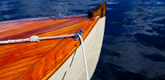 White-and-orange boat on blue waters